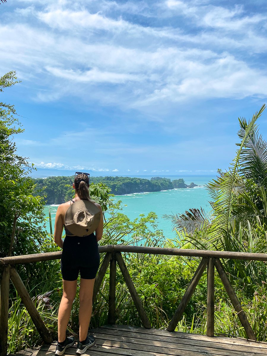 Maddy admiring the beauty of Manuel Antonio National Park during a hike. Hiking here is one of the best things to do in Manuel Antonio.